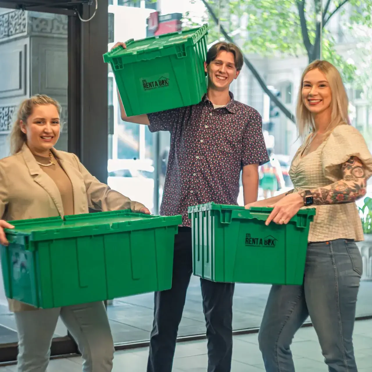 happy customers carrying stl rentabox bins in lobby happy customers carrying stl rentabox bins in lobby